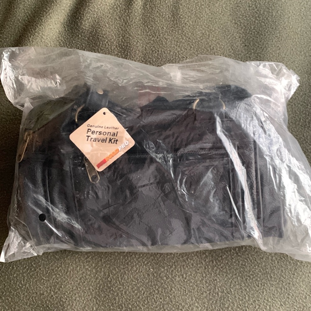 NWT Road Pro black leather Personal Travel Kit. Bottom approximately 8” x 5”.